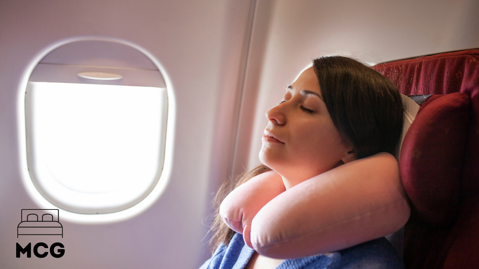woman sleeping on a plane with a microbead neck pillow