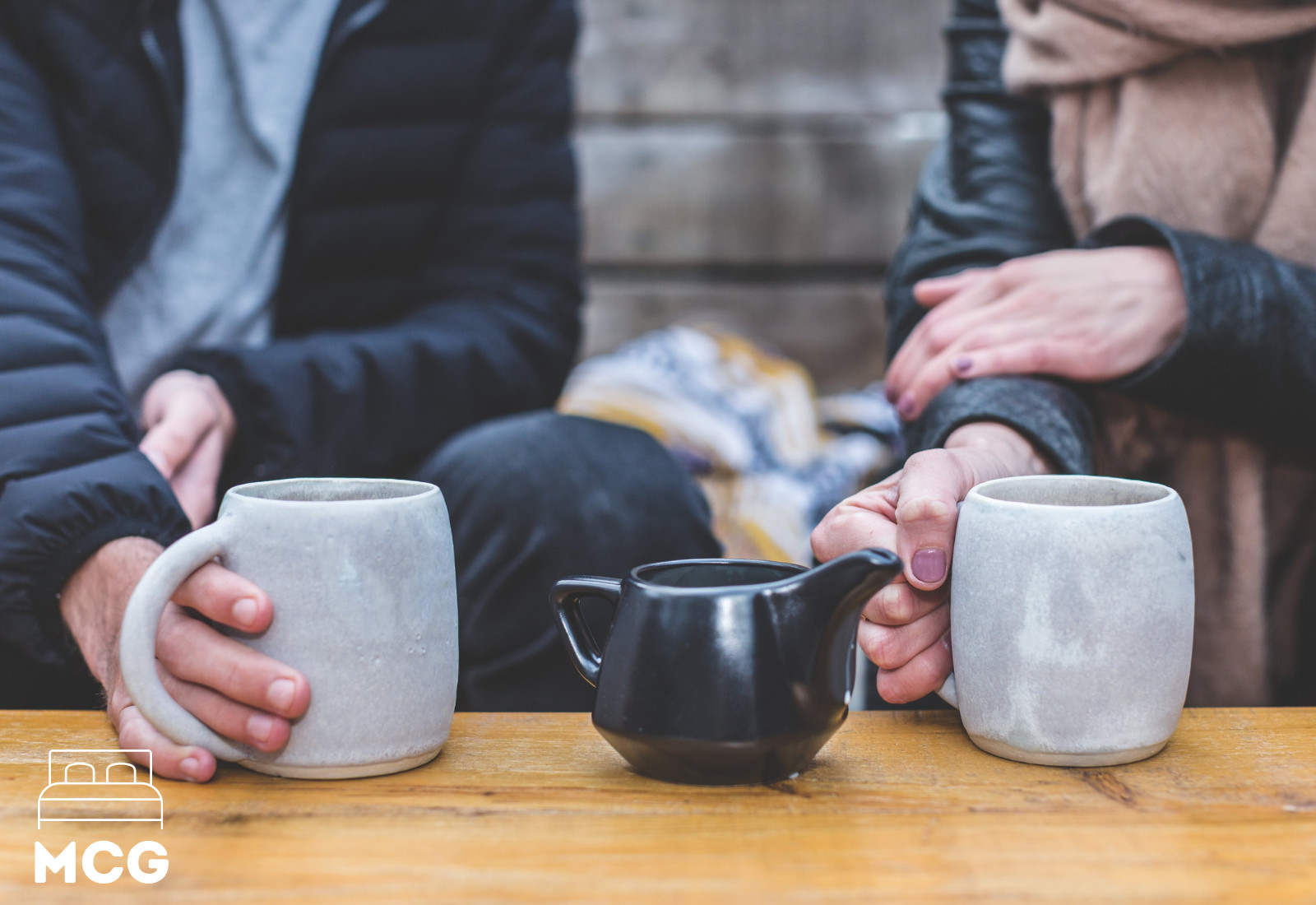 cup of tea and cup of coffee on a table