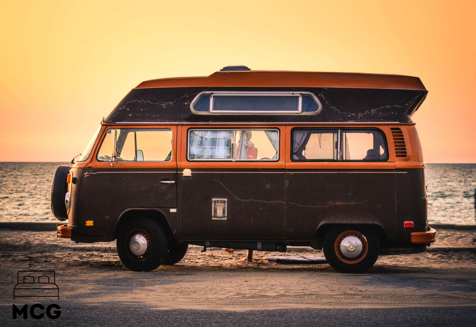 RV camper van with sunset in background