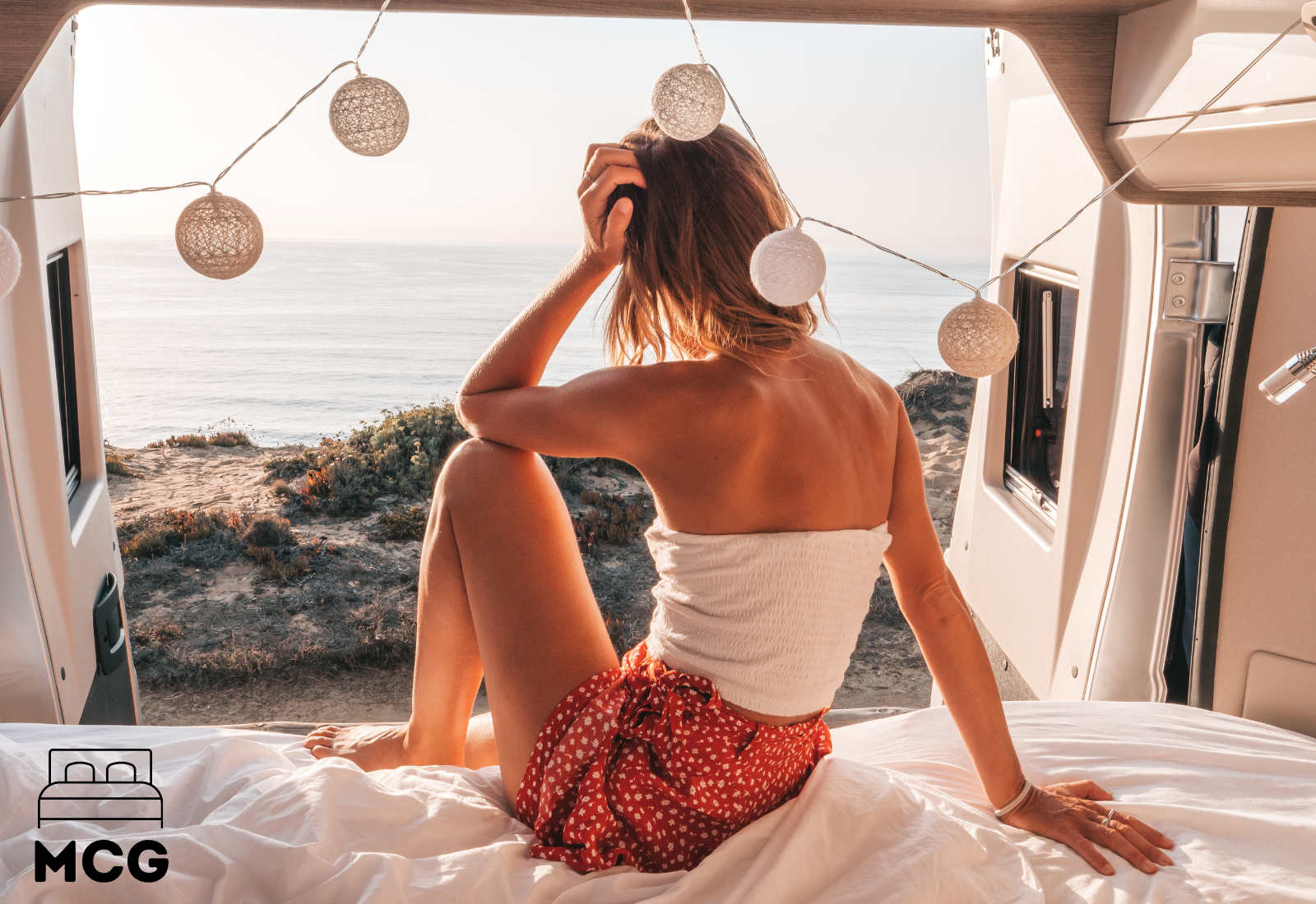 woman in the back of a camper van