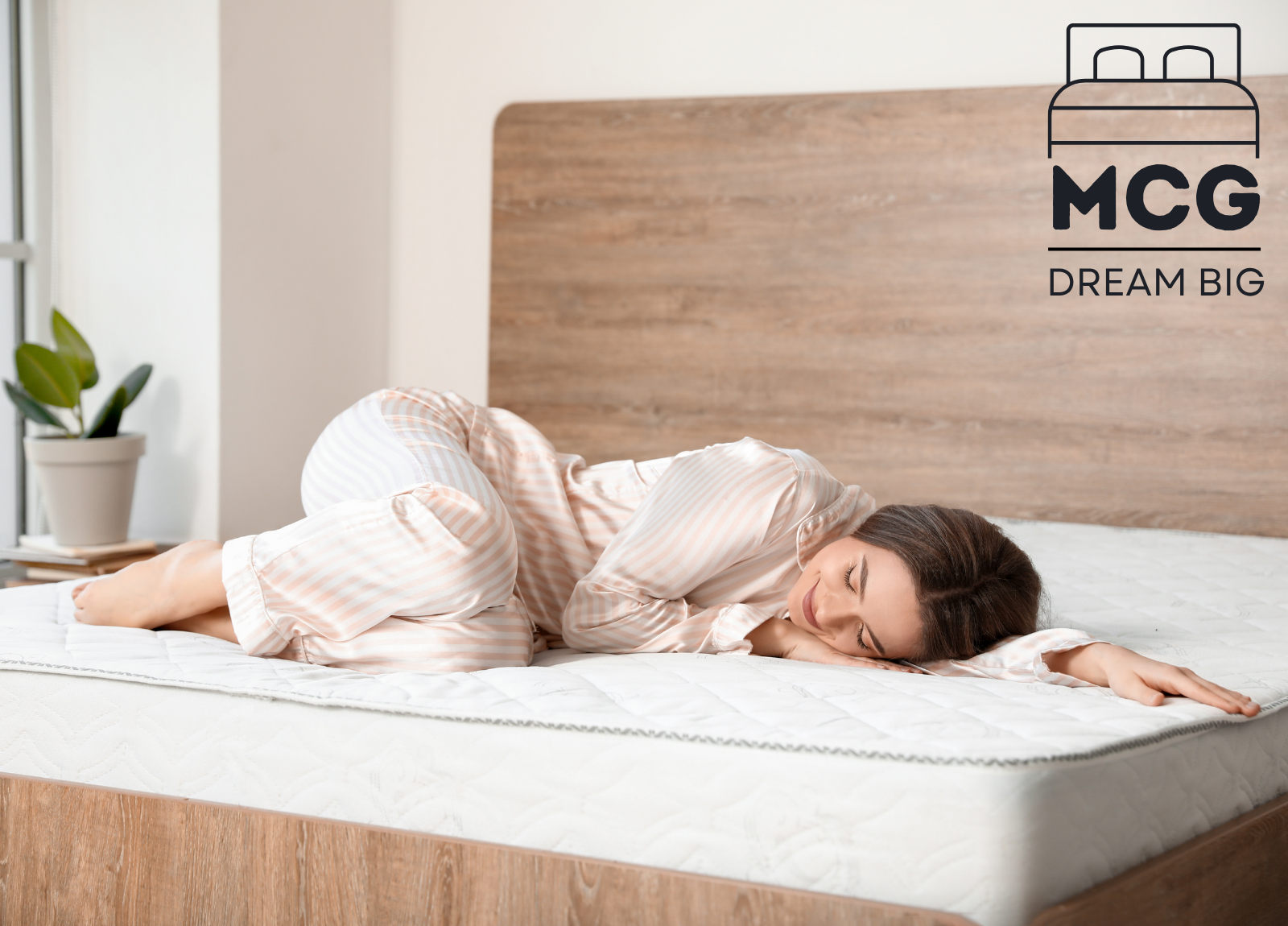 woman asleep on a mattress
